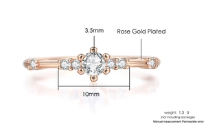 Detail showing 3.5mm main stone and 10mm width measurement of rose gold plated ring
