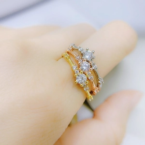 Three-color stackable rings in gold, rose gold and silver with sparkling crystals
