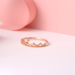 Elegant rose gold crown ring for women featuring fine zircons and beaded edge design