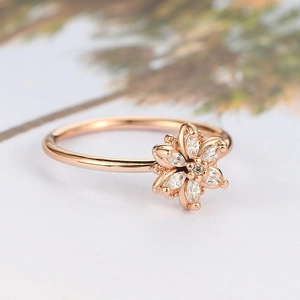 Elegant rose gold flower ring featuring marquise-cut cubic zirconia petals for women