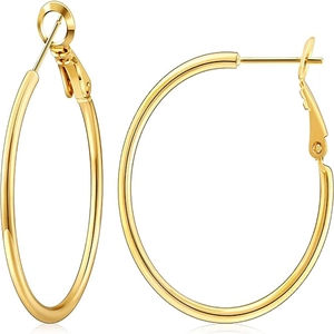 Polished gold large hoop earrings with sleek hollow tube design and secure hinge clasp