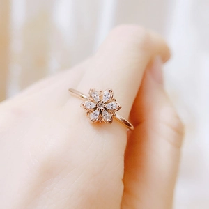 Exquisite 14k gold plated flower ring with pear-cut zircon petals on a slender band