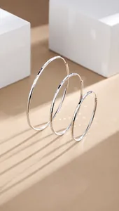 Three sizes of 925 sterling silver hoop earrings with 4cm, 5cm, and 6cm diameters