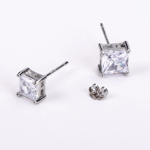 Close-up of S925 sterling silver square stud earrings with 4-claw cubic zirconia inlay