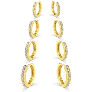 Set of four graduated gold plated huggie earrings featuring sparkling cubic zirconia stones