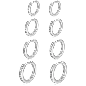Detailed set of four pairs of sterling silver hoop earrings with clear cubic zirconia stones