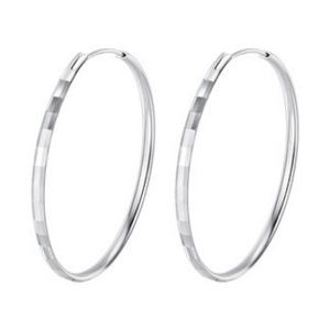 Minimalist large silver hoop earrings with faceted diamond-cut texture and pin closure