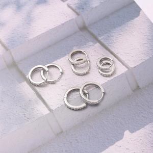 Set of four 925 sterling silver hoop earrings with micro-pave cubic zirconia crystals