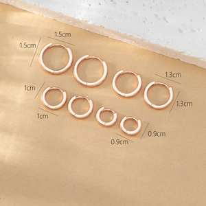 Set of rose gold hoop earrings in four sizes: 1.5cm, 1.3cm, 1.0cm, and 0.9cm