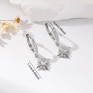 Detailed view of silver hoop earrings with zircon star pendant and size measurements