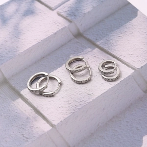Three pairs of S925 sterling silver hoop earrings with cubic zirconia in multiple sizes