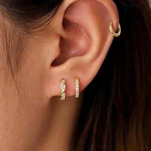 Three-piece set of gold S925 silver stud earrings and ear cuffs with cubic zirconia accents