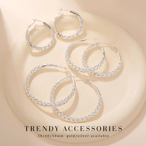Thick twisted silver hoop earrings set in 30mm, 40mm, and 50mm sizes for women
