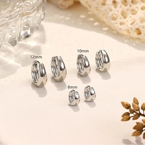 Polished silver hoop earrings set in 8mm, 10mm, and 12mm sizes for a trendy layered look