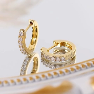 Classic 14K gold-plated huggie hoop earrings with sparkling cubic zirconia on mirror tray