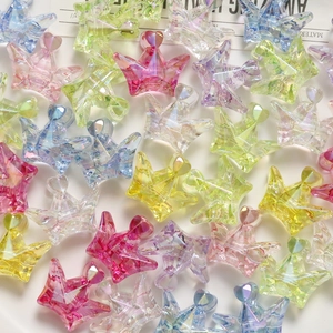 Close-up of colorful crown-shaped acrylic beads for DIY jewelry and hair accessory crafts