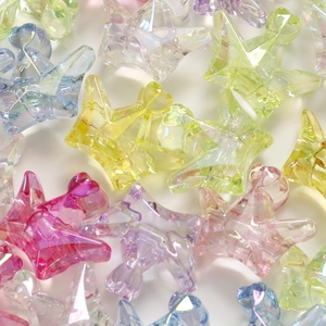 Close-up of colorful acrylic crown beads with vibrant macaron colors for DIY jewelry making