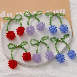 Handmade crystal beaded cherry charms in red, purple, and blue for hair accessories