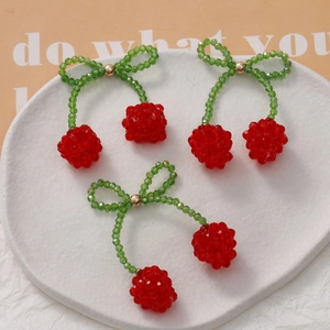 Handmade beaded cherry charms with red crystal beads and green bow for DIY jewelry making