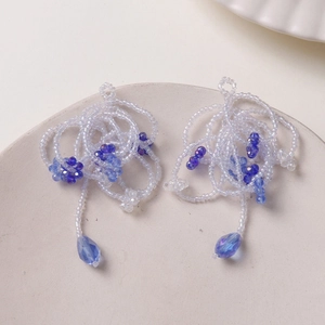 Handmade beaded drop earrings with white seed beads and blue crystal water droplets