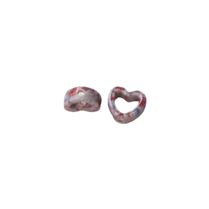 Hand-painted heart-shaped ceramic beads with red and blue camouflage marble pattern for DIY