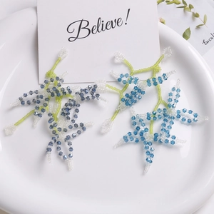 Handmade crystal beaded flower ornament in blue and clear glass for DIY jewelry making