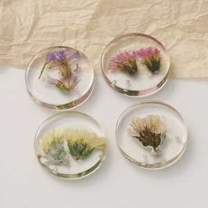 Round clear resin earring pendants with real dried flowers and small white pearls