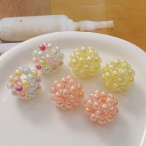 Handmade woven acrylic bead spheres for DIY jewelry making in assorted pearlescent colors