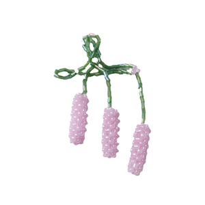 Handmade lavender beaded earrings with green stems and purple floral clusters