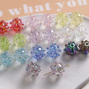 Macro detail of colorful AB coated spiky sea urchin beads for jewelry making