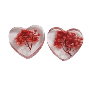 Handmade heart-shaped resin charms with embedded red dried flowers and white pearls