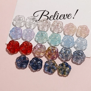 Detailed view of colorful multi-layered five-petal resin beads for DIY jewelry making