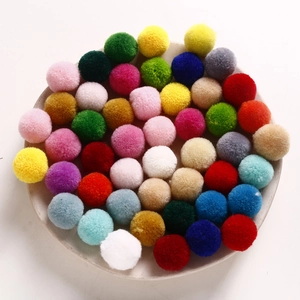 Colorful 20mm plush pom-poms for DIY jewelry and hair accessories in a round tray