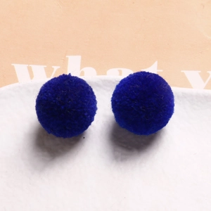 Macro detail of high-quality navy blue 20mm plush round balls for DIY jewelry making