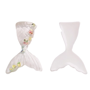Transparent resin mermaid tail DIY accessories with colorful iridescent sequins on white back