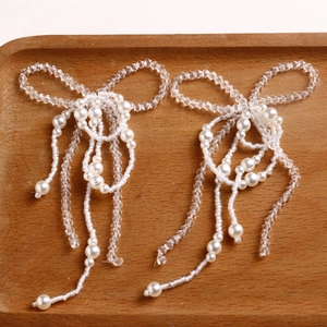 Handmade woven pearl bow accessories with fringe tassel in white and clear beads