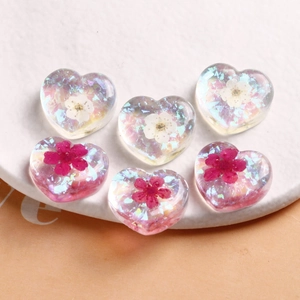 Translucent heart resin charms with glitter and dried flowers for DIY jewelry making