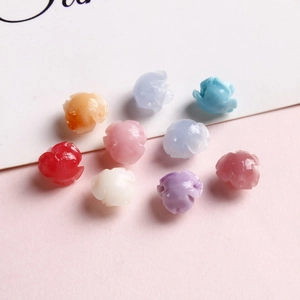 Nueve cuentas de resina con forma de rosa de colores para hacer joyas artesanales
