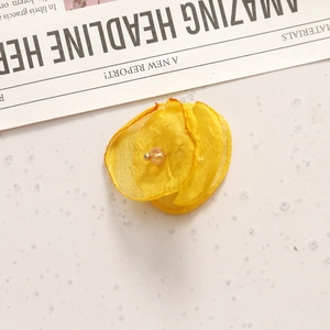 Handmade yellow organza flower hair clip accessory with crystal bead center