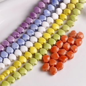 Colorful 12mm shell-shaped ceramic beads with polished finish for DIY jewelry making