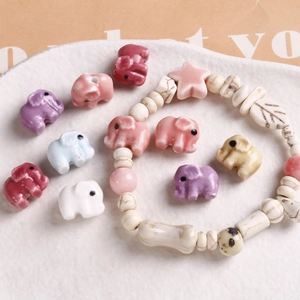 Colorful ceramic beads shaped like elephants and stars for DIY bracelet making projects
