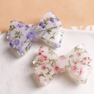 Floral acrylic bow hair clips set featuring pink and purple sweet leaf patterns