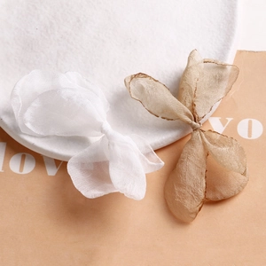 Eleganti fiocchi in organza nei colori bianco e oro champagne per accessori per capelli