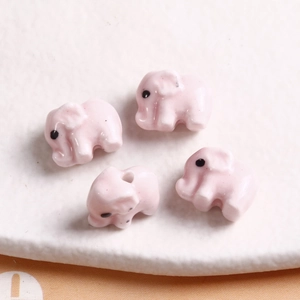 Pink ceramic elephant beads with smooth glaze and pre-drilled holes for DIY jewelry