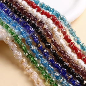 Perle ovali in vetro fatte a mano con foglia d'oro per la creazione di gioielli DIY