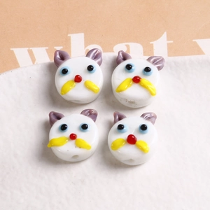 Set of four handmade white lampwork glass cat beads for DIY jewelry and crafts