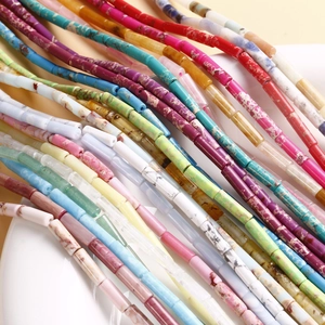 Detailed macro view of colorful cylinder natural stone beads with distinct crackle textures