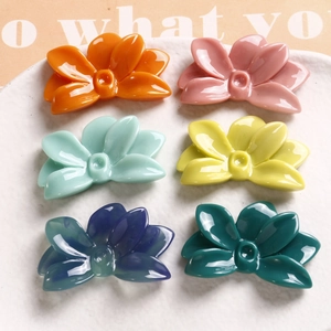 Polished resin flower charms in six vibrant colors for DIY jewelry and hair accessories