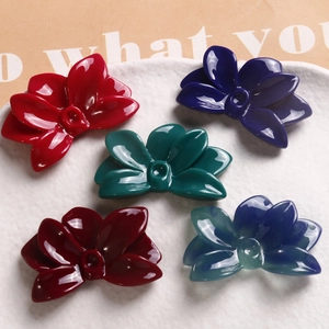 Set of five colorful glossy resin flower charms for DIY jewelry and hair accessories
