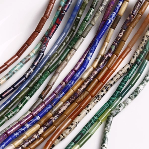 Macro detail of colorful cylindrical natural stone beads for DIY jewelry making